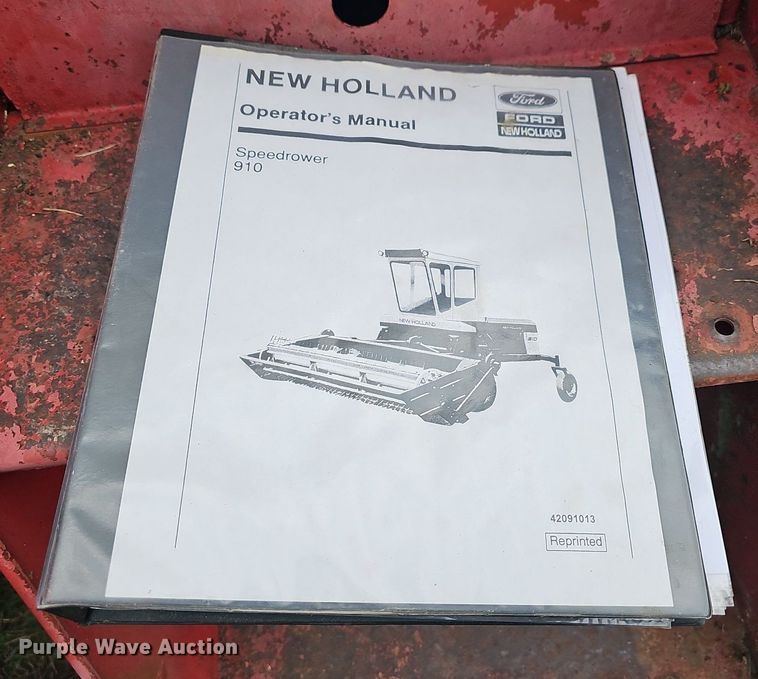 image for item NT9796 New Holland 910  swather / windrower