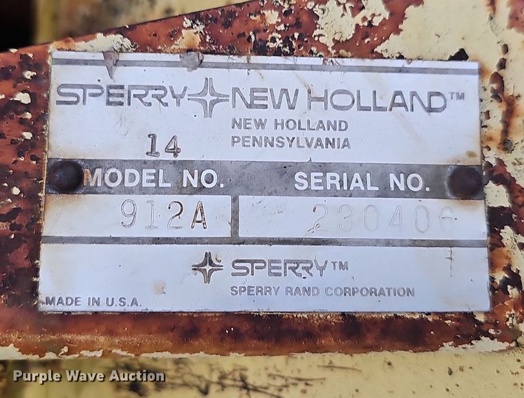 image for item NT9796 New Holland 910  swather / windrower