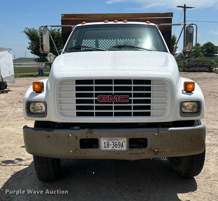 image for item NP9892 1999 GMC C7H042  flatbed truck