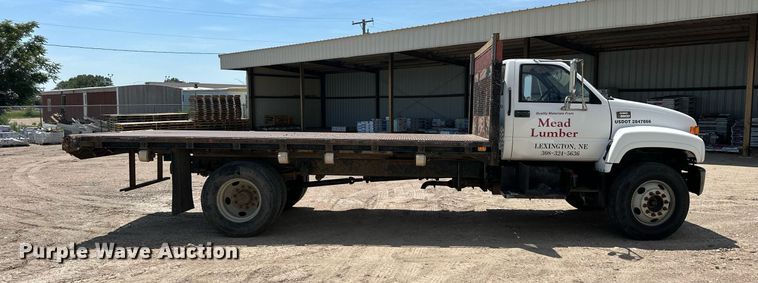 image for item NP9892 1999 GMC C7H042  flatbed truck