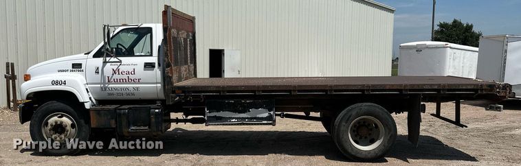 image for item NP9892 1999 GMC C7H042  flatbed truck