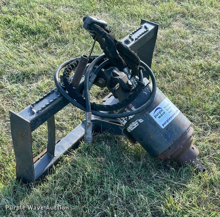 image for item DM0342 2015 Paladin X1975 skid steer auger