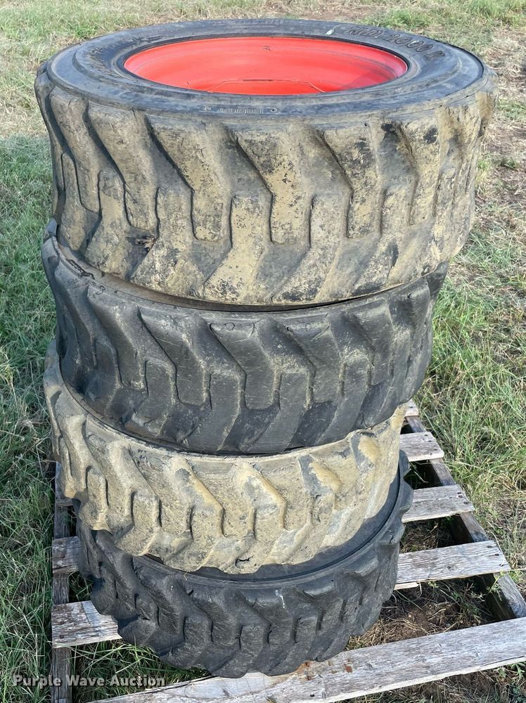 image for item DM0359 (8) skid steer tires and wheels 