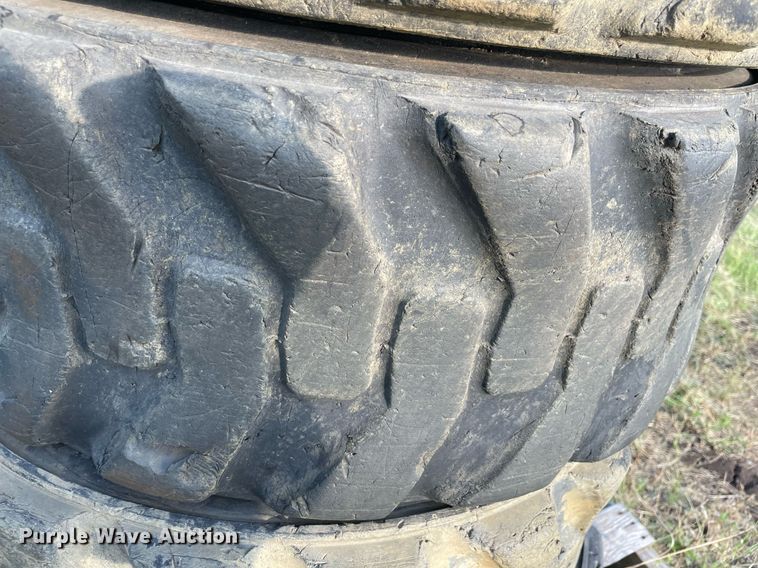 image for item DM0359 (8) skid steer tires and wheels 