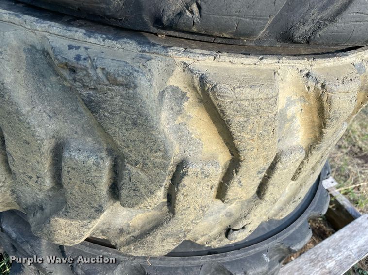 image for item DM0359 (8) skid steer tires and wheels 