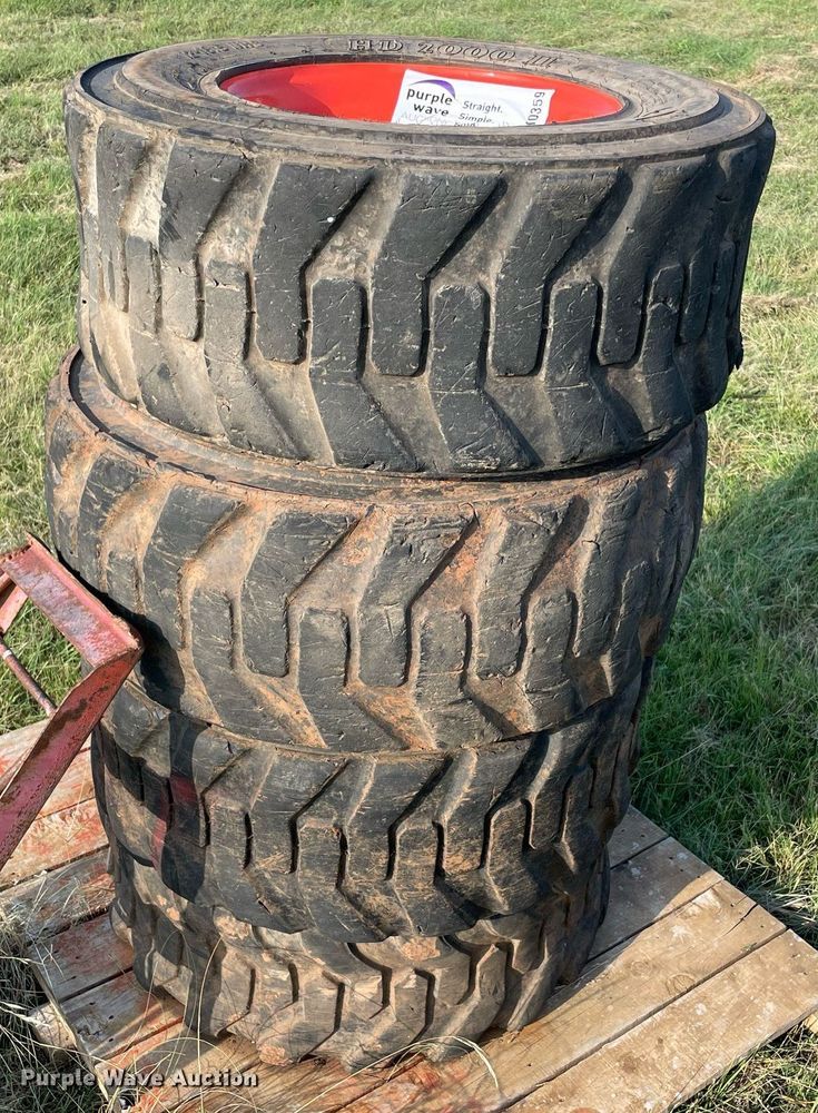 image for item DM0359 (8) skid steer tires and wheels 