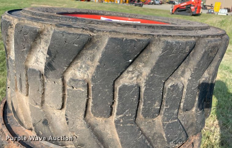 image for item DM0359 (8) skid steer tires and wheels 