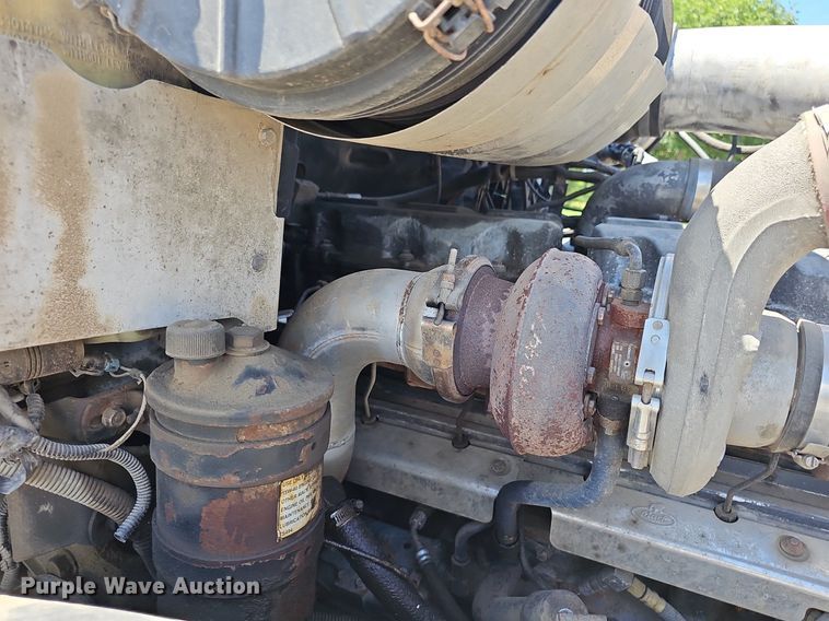 image for item DN8607 2005 Mack CV713  roll-off container truck