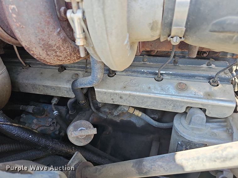 image for item DN8607 2005 Mack CV713  roll-off container truck