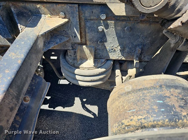 image for item DN8607 2005 Mack CV713  roll-off container truck