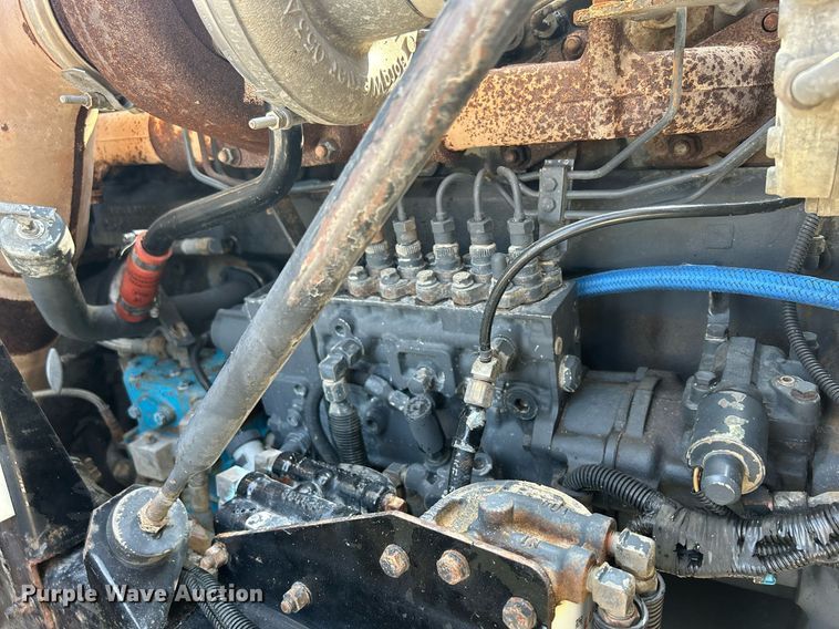 image for item DQ0874 1998 Mack RB690S  roll-off container truck