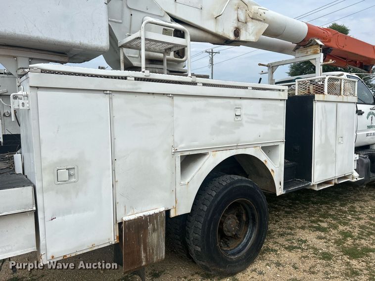 image for item DQ0875 1997 GMC C7500  bucket truck