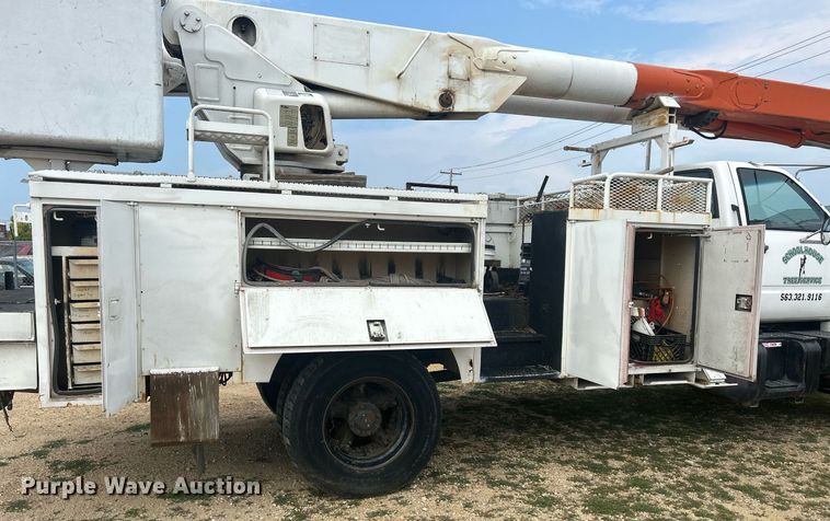 image for item DQ0875 1997 GMC C7500  bucket truck