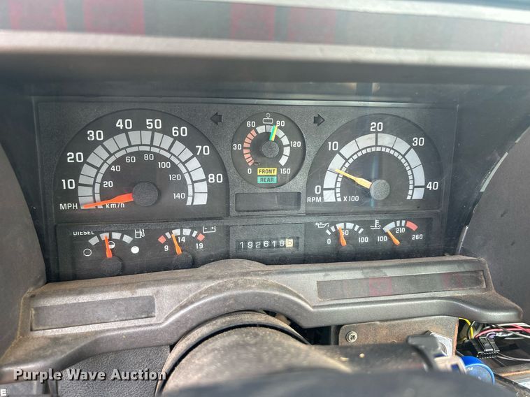 image for item DQ0875 1997 GMC C7500  bucket truck