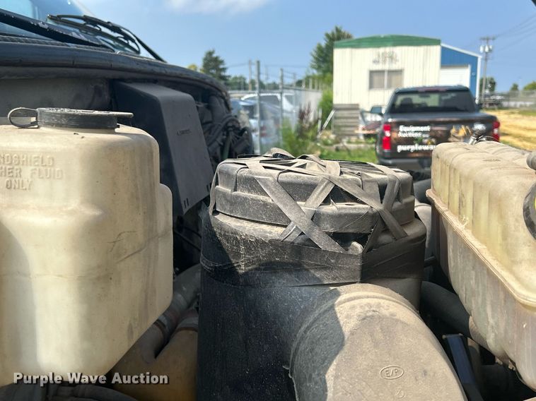 image for item DQ0875 1997 GMC C7500  bucket truck