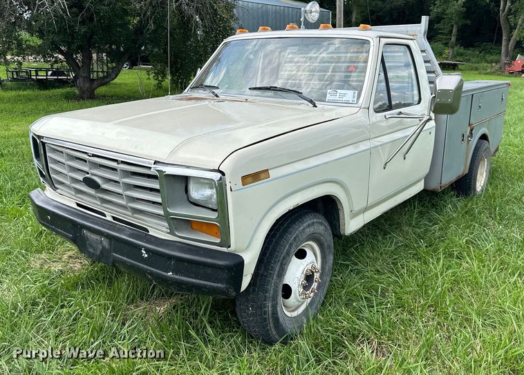 image for item DS2180 1985 Ford F350  utility bed pickup truck