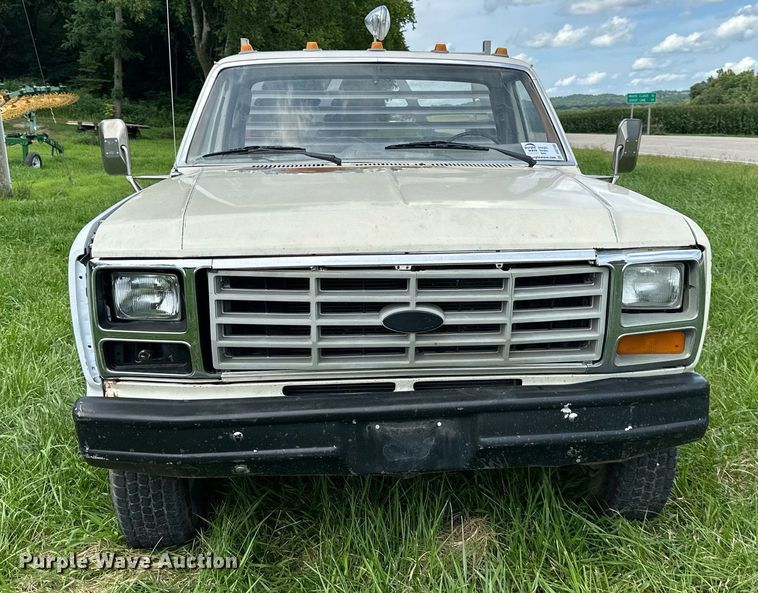 image for item DS2180 1985 Ford F350  utility bed pickup truck