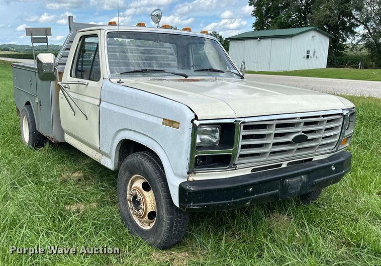 image for item DS2180 1985 Ford F350  utility bed pickup truck