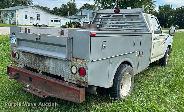 image for item DS2180 1985 Ford F350  utility bed pickup truck