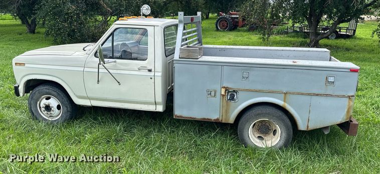 image for item DS2180 1985 Ford F350  utility bed pickup truck
