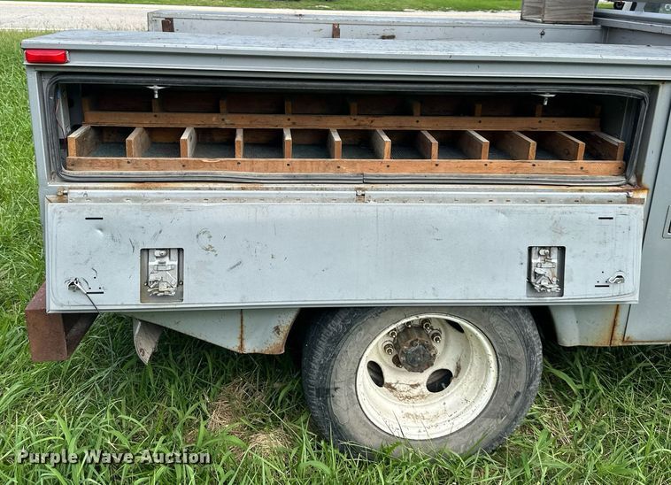 image for item DS2180 1985 Ford F350  utility bed pickup truck