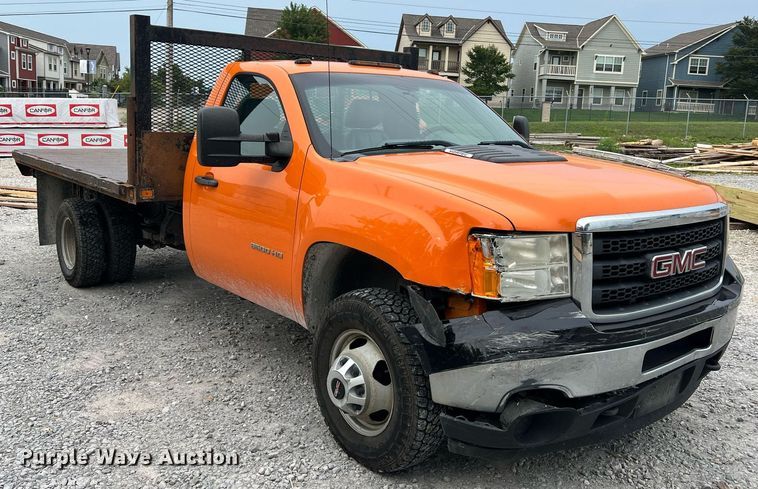 image for item II9220 2011 GMC Sierra 3500HD  dump flatbed pickup truck