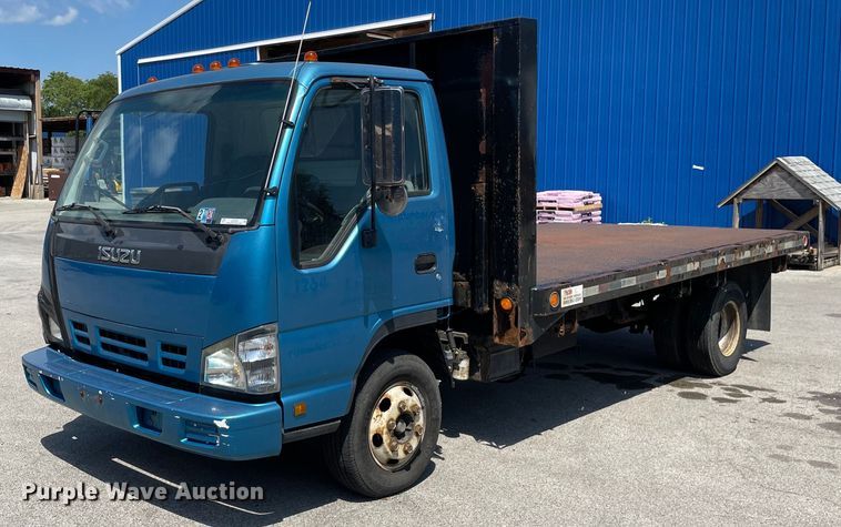 image for item LJ9785 2007 Isuzu NPR  dump flatbed truck