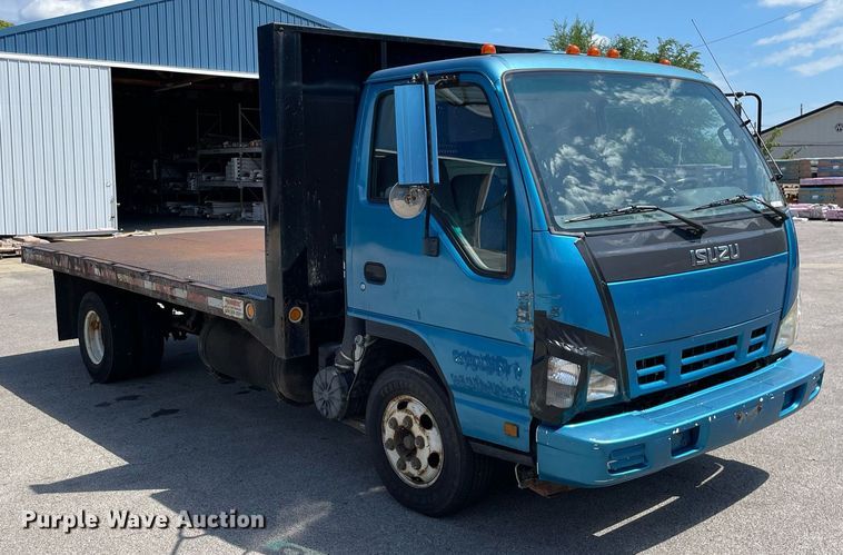 image for item LJ9785 2007 Isuzu NPR  dump flatbed truck