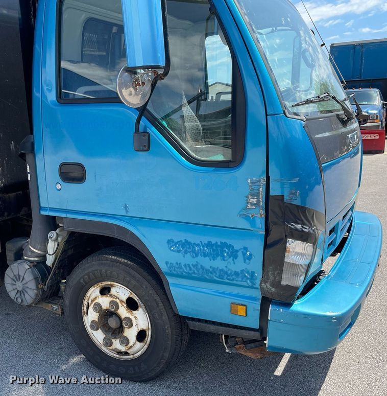 image for item LJ9785 2007 Isuzu NPR  dump flatbed truck