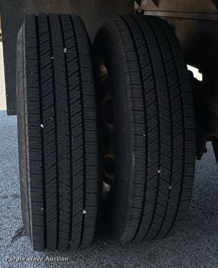 image for item LJ9785 2007 Isuzu NPR  dump flatbed truck