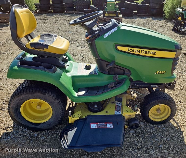 image for item NU9110 John Deere X320  lawn mower