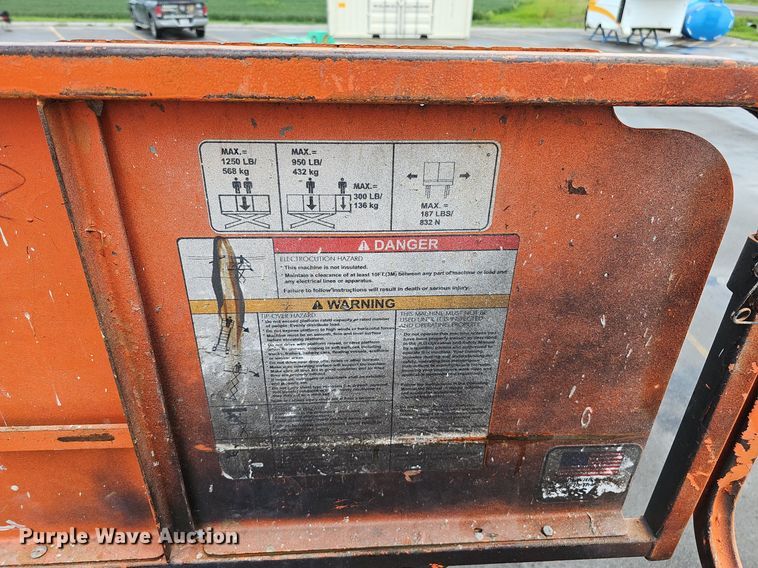 image for item DQ0148 JLG 260MRT  scissor lift