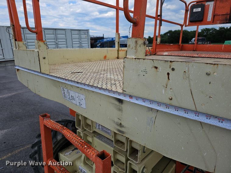 image for item DQ0148 JLG 260MRT  scissor lift