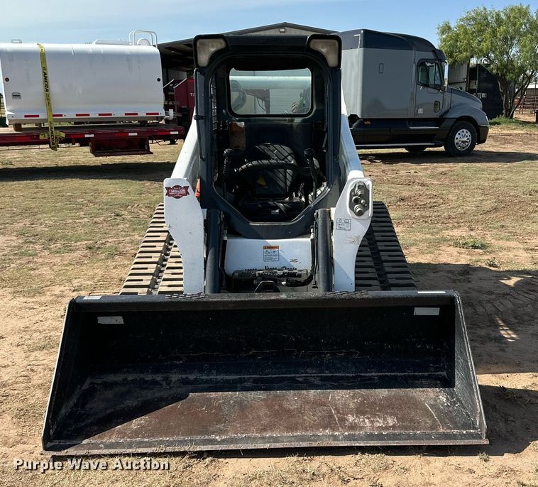 image for item KM9850 2014 Bobcat T750  tracked skid steer loader