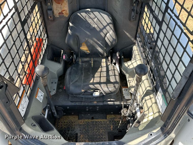 image for item KM9850 2014 Bobcat T750  tracked skid steer loader