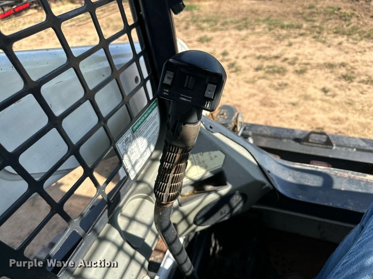 image for item KM9850 2014 Bobcat T750  tracked skid steer loader