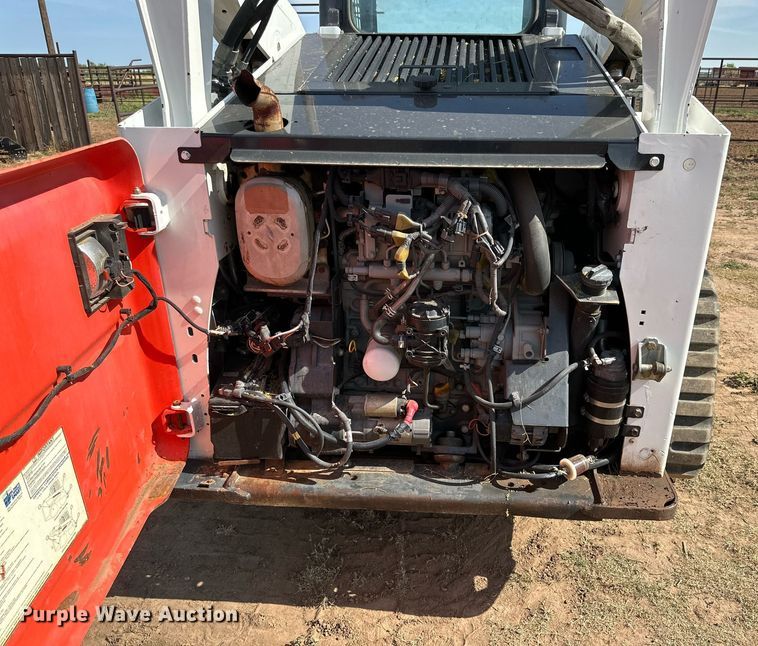 image for item KM9850 2014 Bobcat T750  tracked skid steer loader