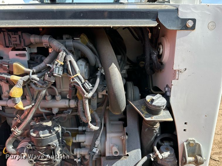 image for item KM9850 2014 Bobcat T750  tracked skid steer loader