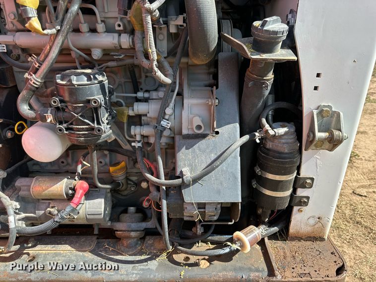 image for item KM9850 2014 Bobcat T750  tracked skid steer loader