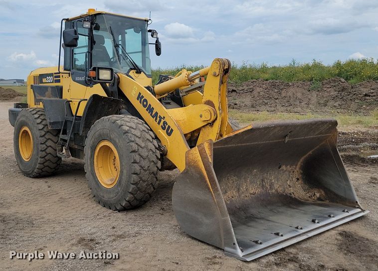 image for item LQ9085 2014 Komatsu WA320-7  wheel loader