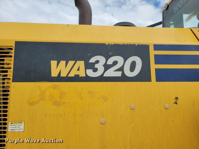 image for item LQ9085 2014 Komatsu WA320-7  wheel loader