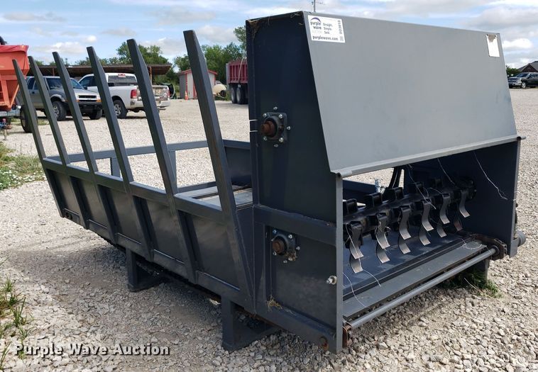 image for item DO3018 Top Notch  skid steer bale processor