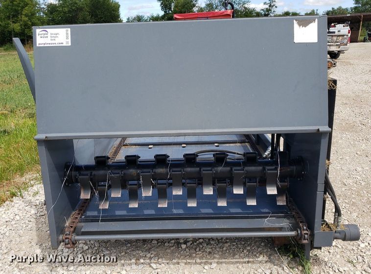 image for item DO3018 Top Notch  skid steer bale processor