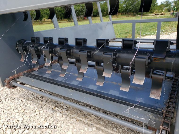 image for item DO3018 Top Notch  skid steer bale processor