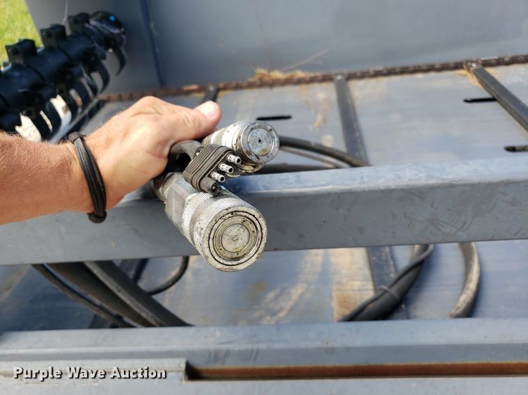 image for item DO3018 Top Notch  skid steer bale processor