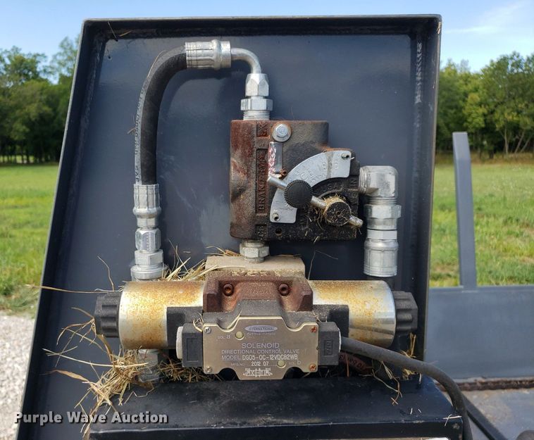 image for item DO3018 Top Notch  skid steer bale processor