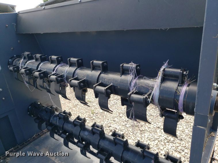 image for item DO3018 Top Notch  skid steer bale processor