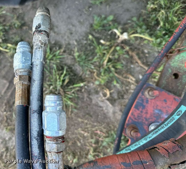 image for item NP9975 New Holland 116  swather / windrower