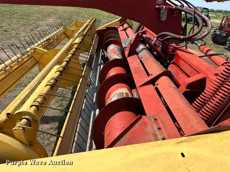 image for item NP9975 New Holland 116  swather / windrower