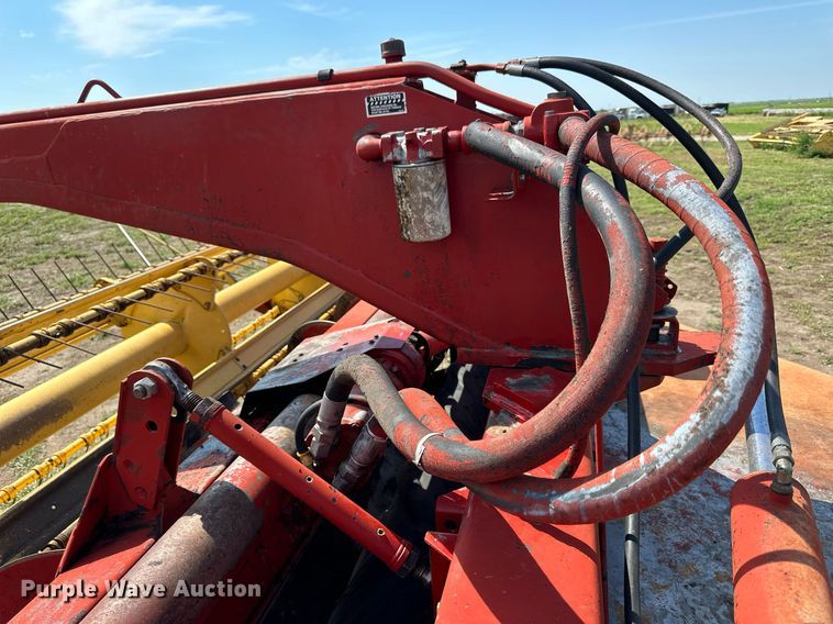 image for item NP9975 New Holland 116  swather / windrower